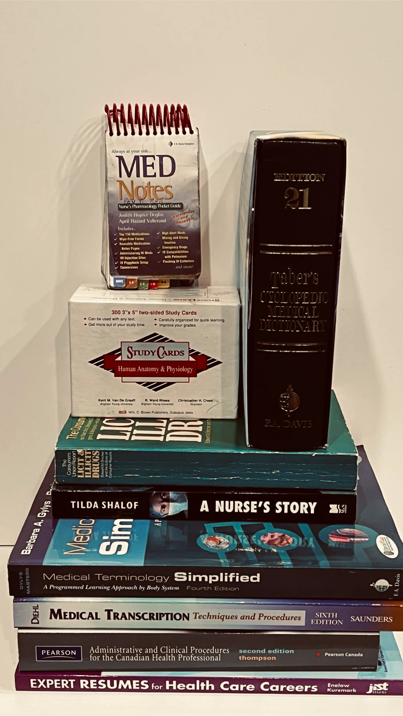 Bundle of Medical Textbooks and Study Cards