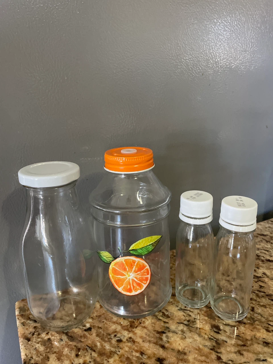Assorted Glass Bottles and Jar