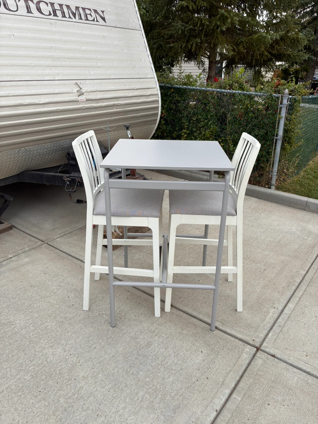 Three-piece pub style table and chair set
