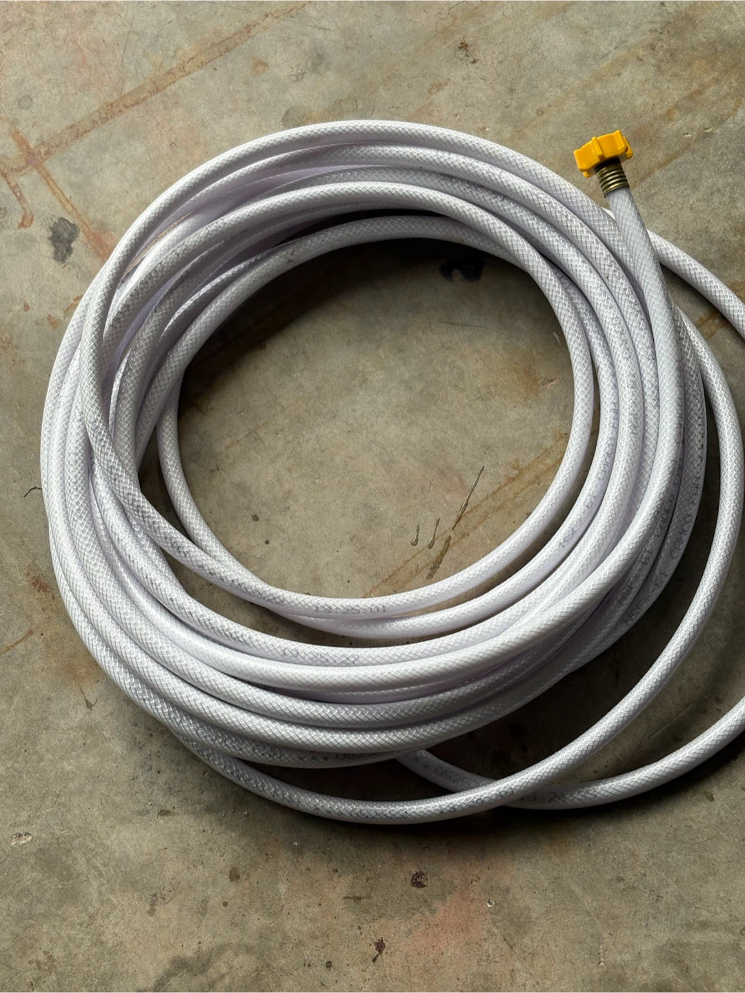 White Garden Hose with Yellow Connector