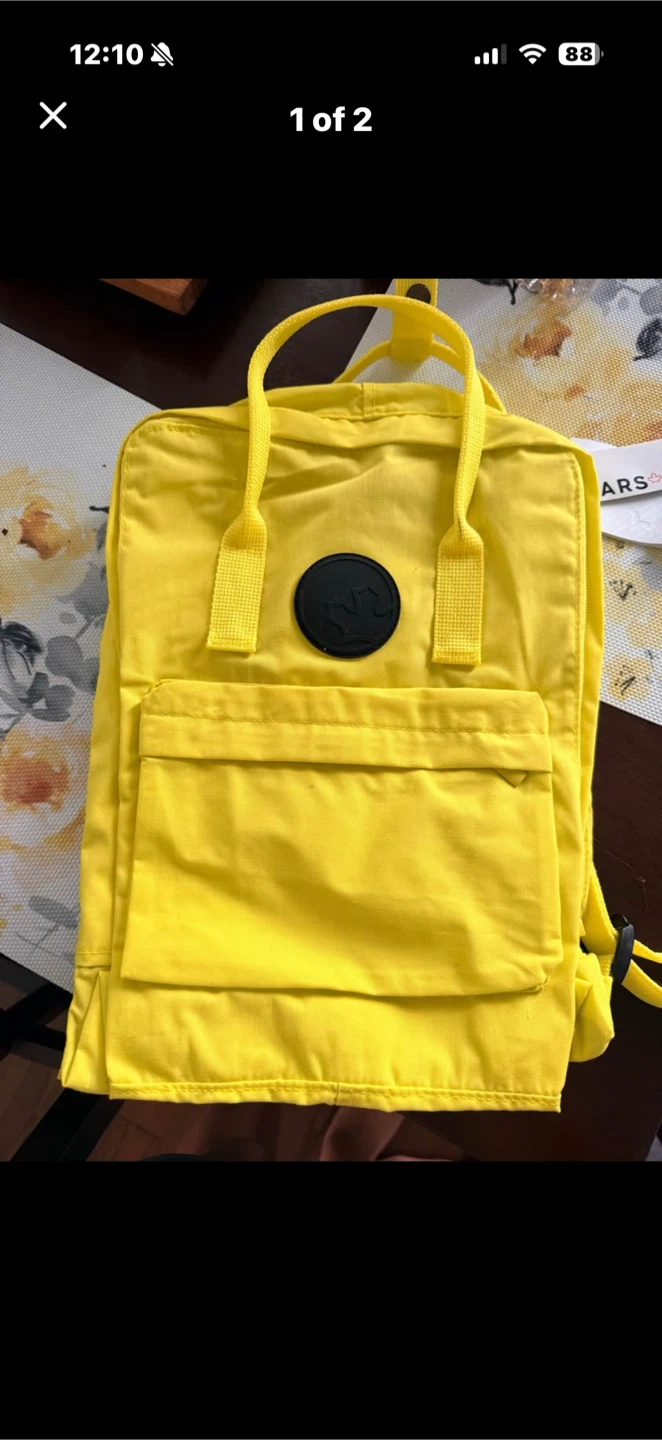 Yellow Fjallraven Kanken Backpack
