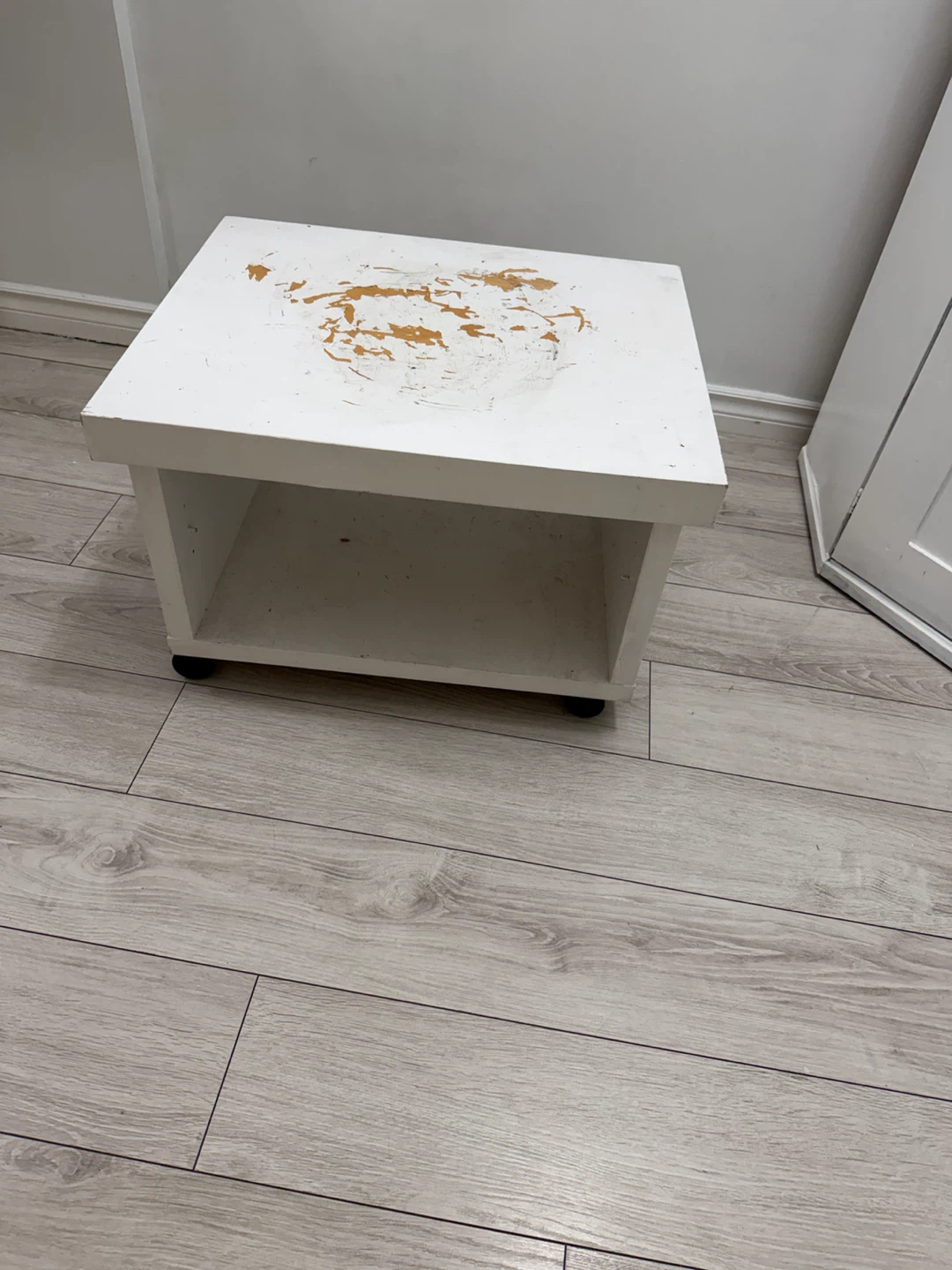 White rolling side table
