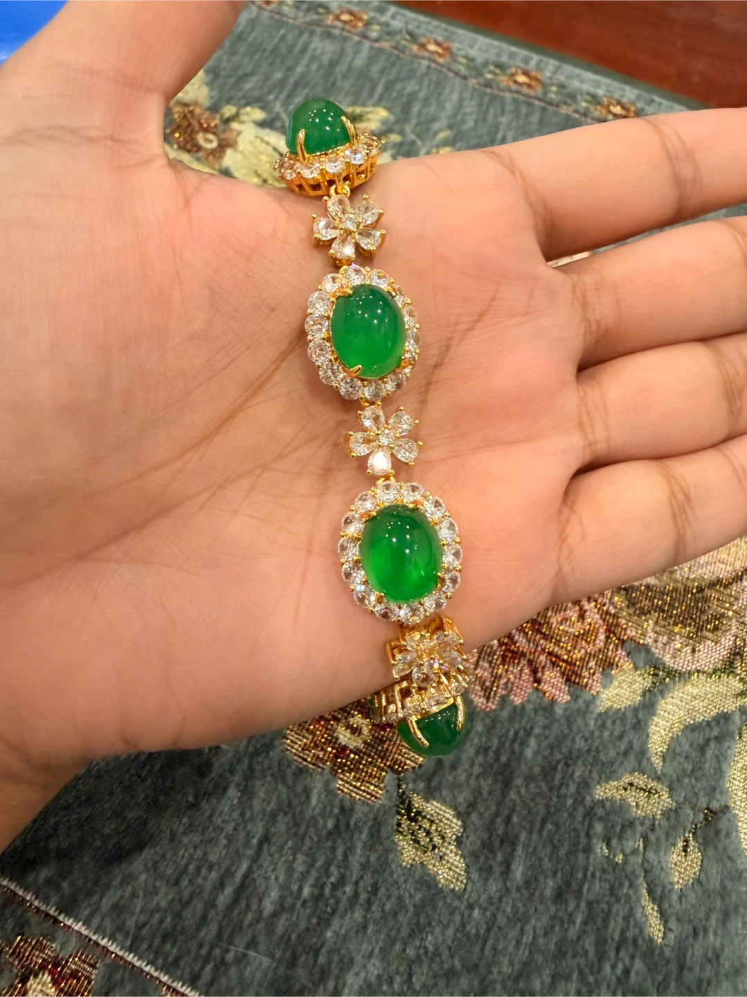 Gold and Jade Bracelet with stones.