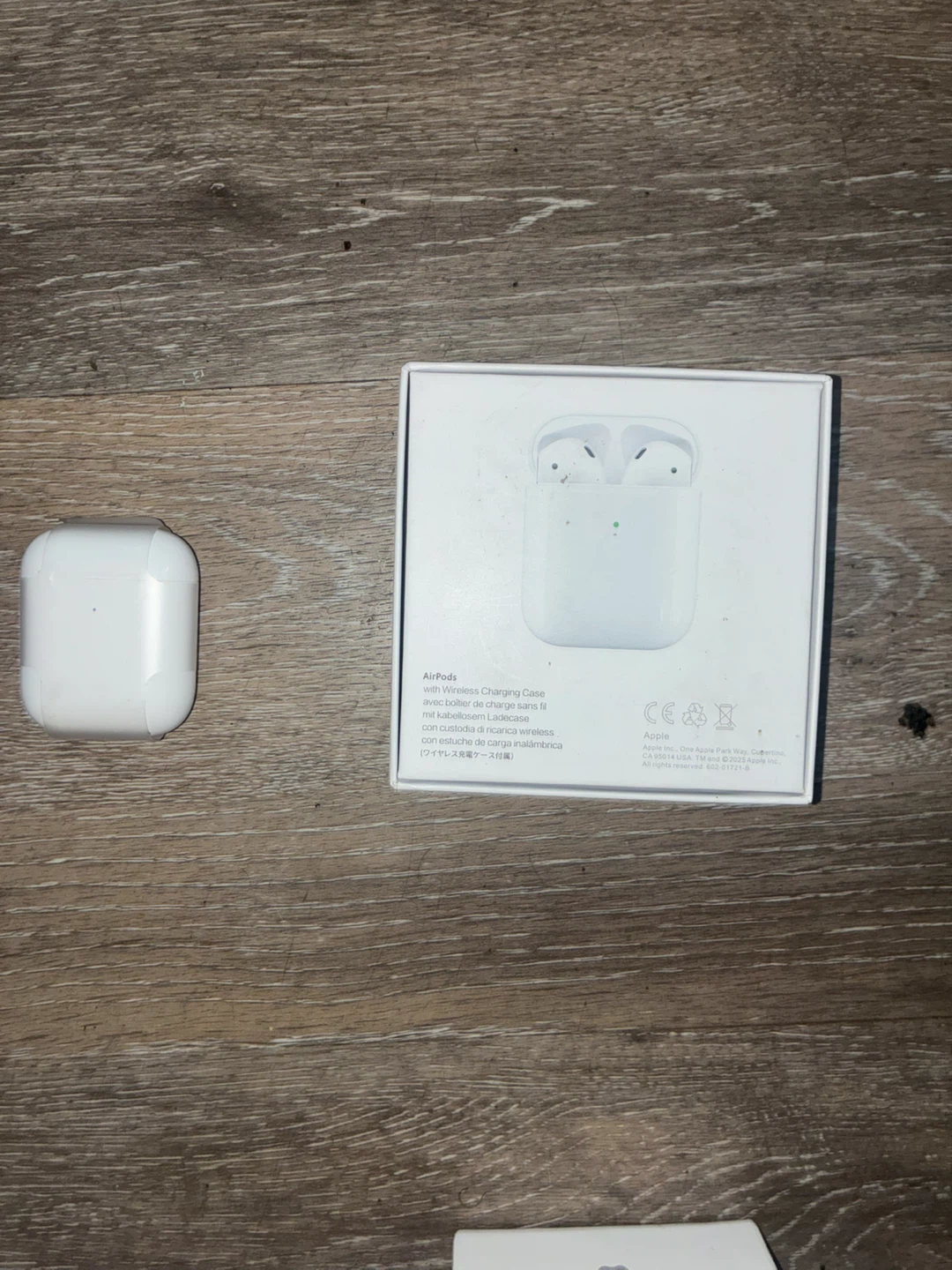 Apple AirPods Gen 2  with Wireless Charging Case - photo 2