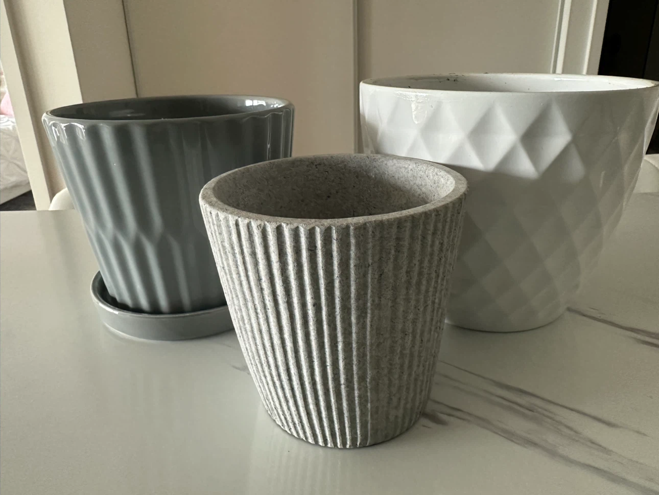 Set of three decorative plant pots