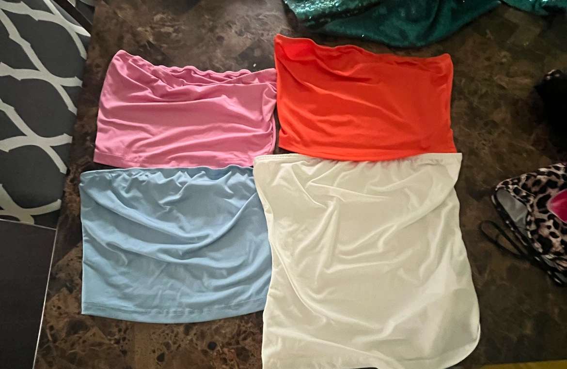 Four tube tops - pink, blue, orange, and white