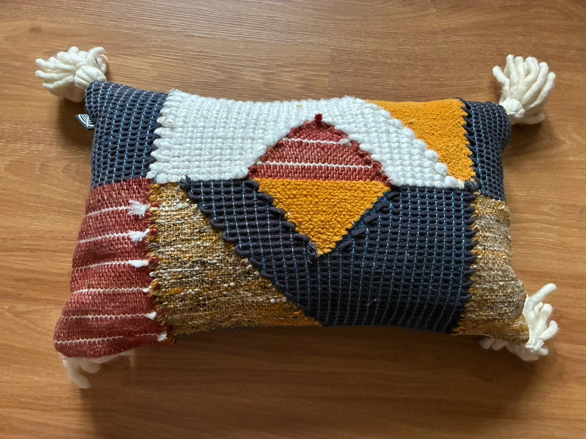 Simons Geometric Patchwork Tassel Cushion – 35 × 50 cm