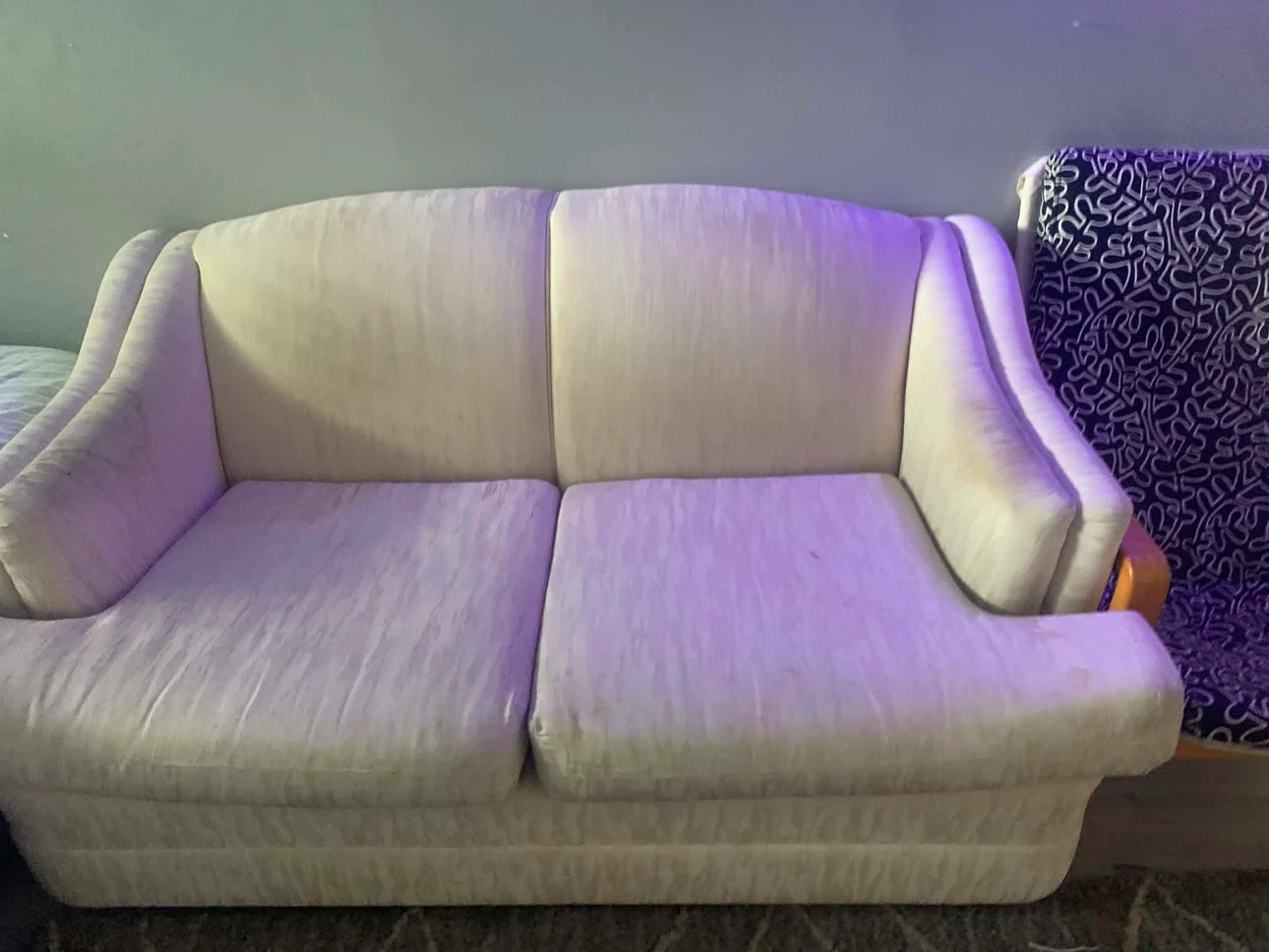 Cream coloured loveseat sofa