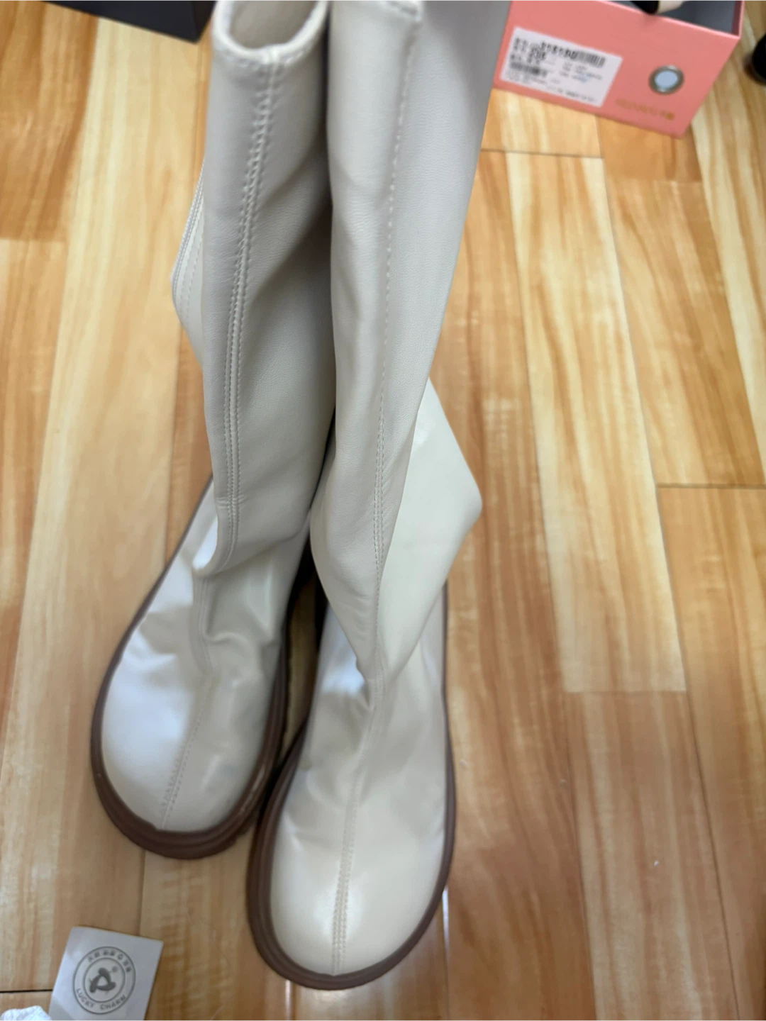 cream knee-high boots