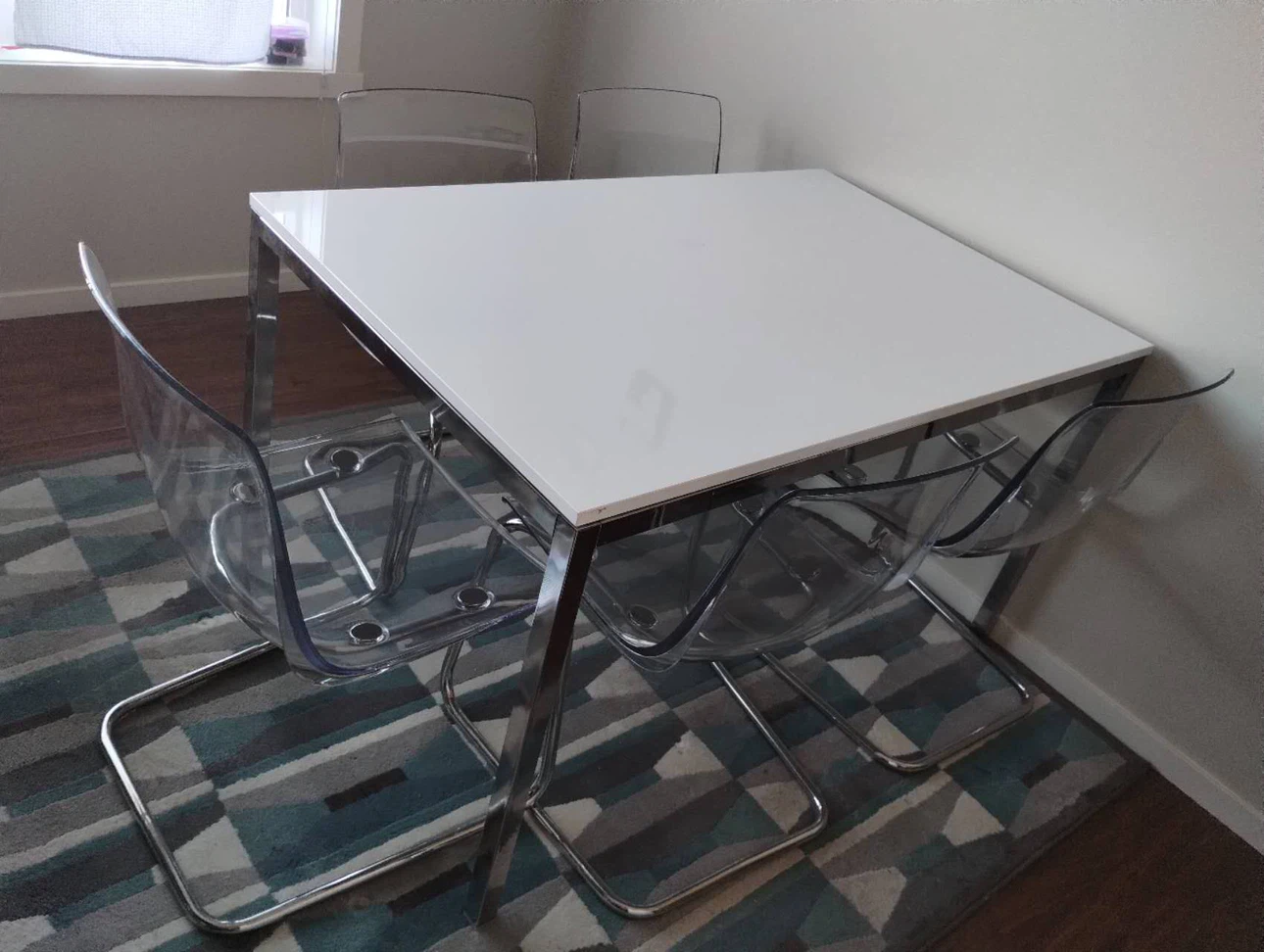 Modern Dining Table with Clear Chairs