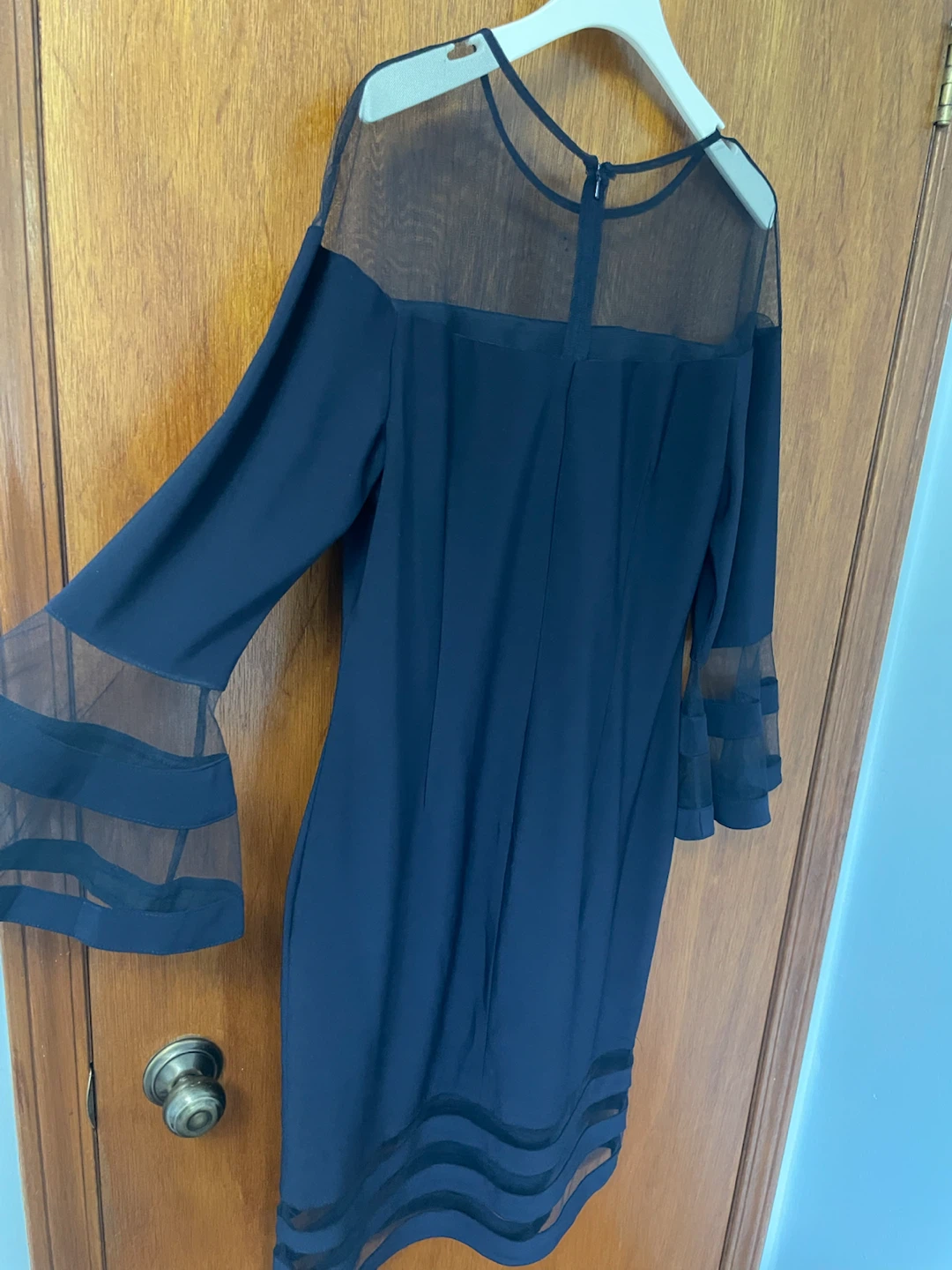 Black cocktail dress with mesh detail