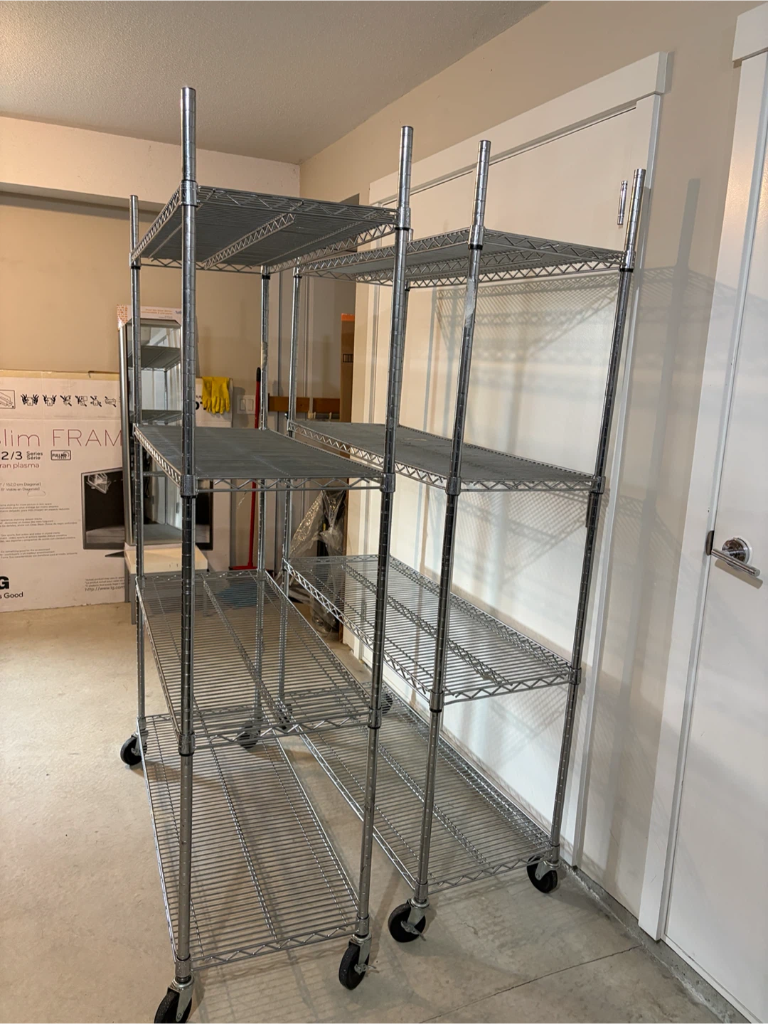 A set of 2 Costco Chrome Wire Shelving Unit with Wheels - photo 2