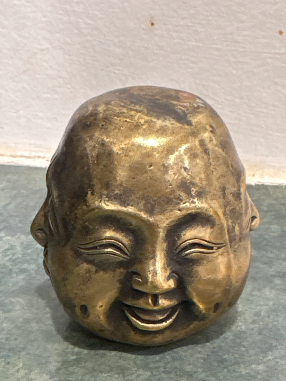 Brass Four-Faced Figurine