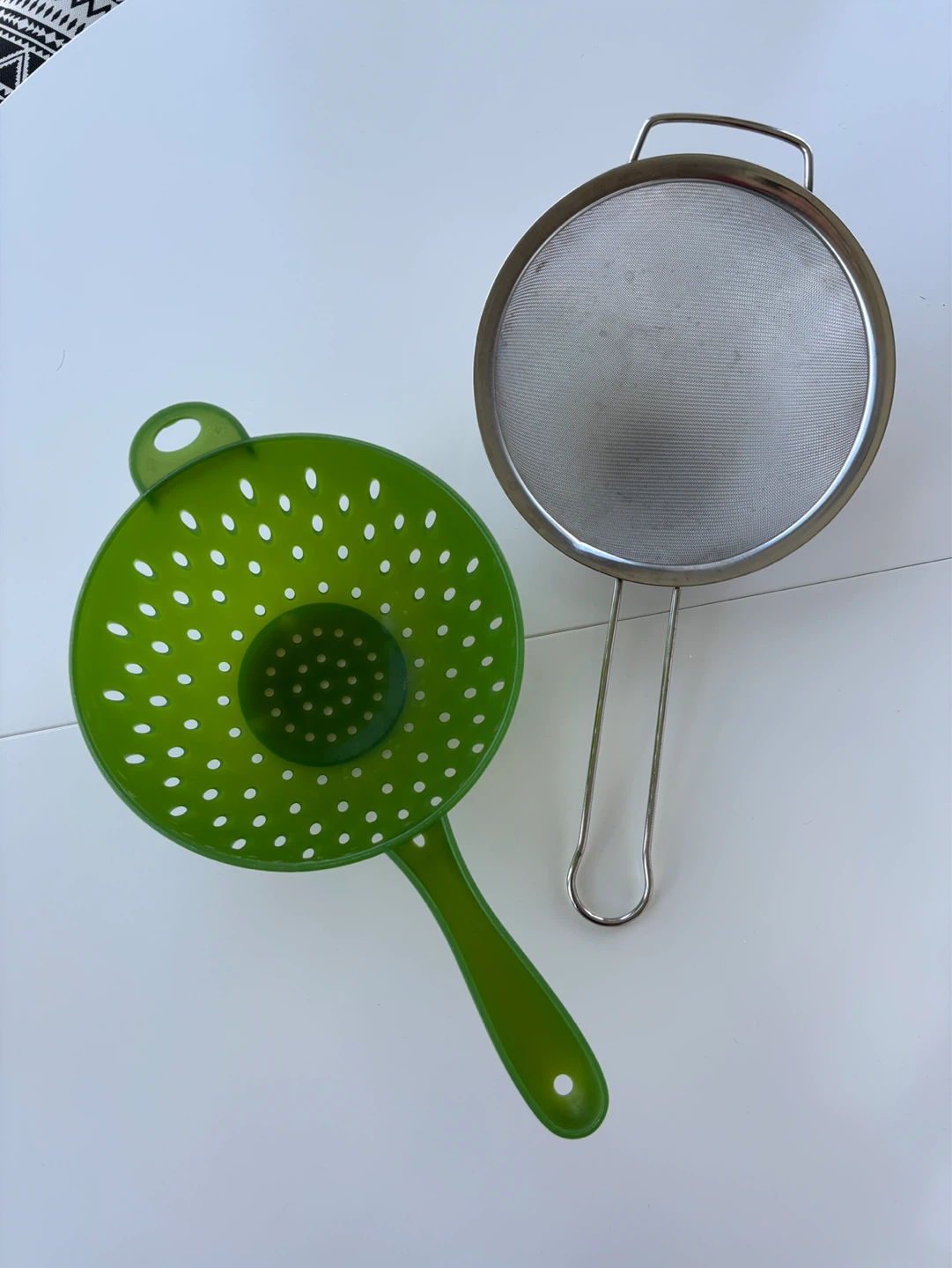 Two kitchen colanders