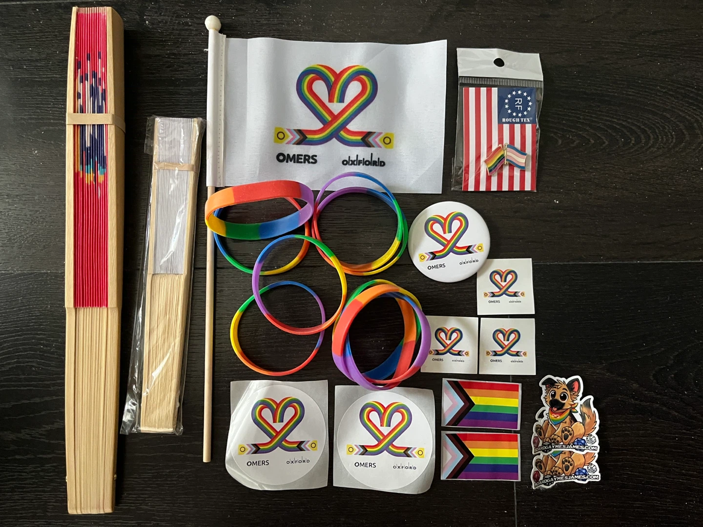 Pride Themed Fan, Bracelets, Stickers, and Pins Set