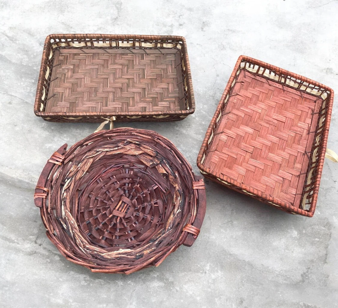 Set of three decorative woven baskets