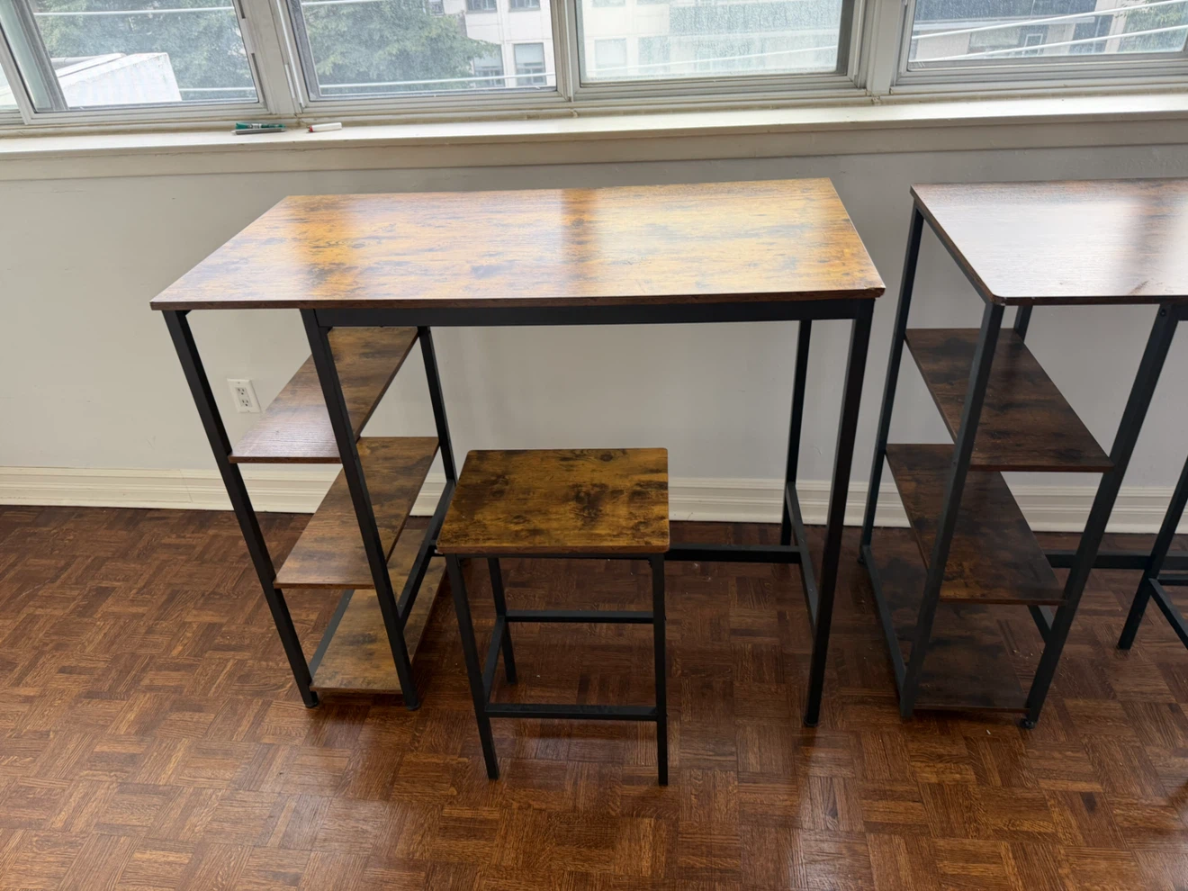 Two Industrial Bar Tables with Matching Stools