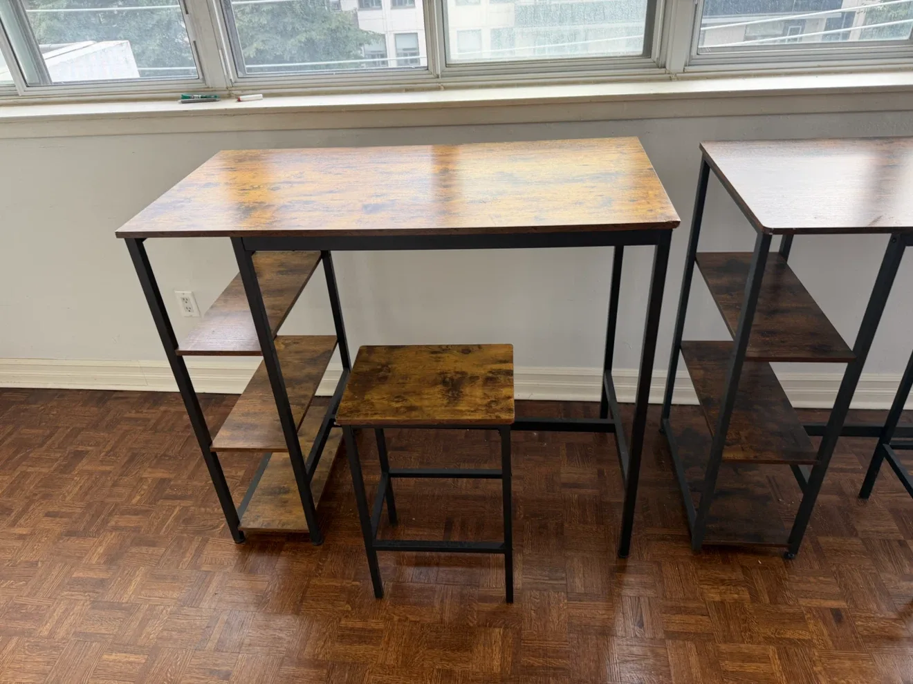 Two Industrial Bar Tables with Matching Stools