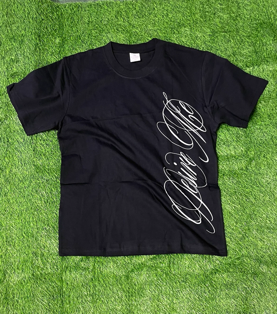 Black T-Shirt with White Script Graphic