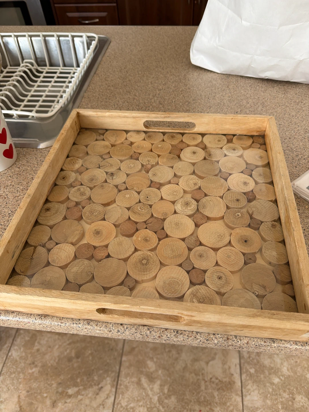 Wooden serving tray with wood slice design
