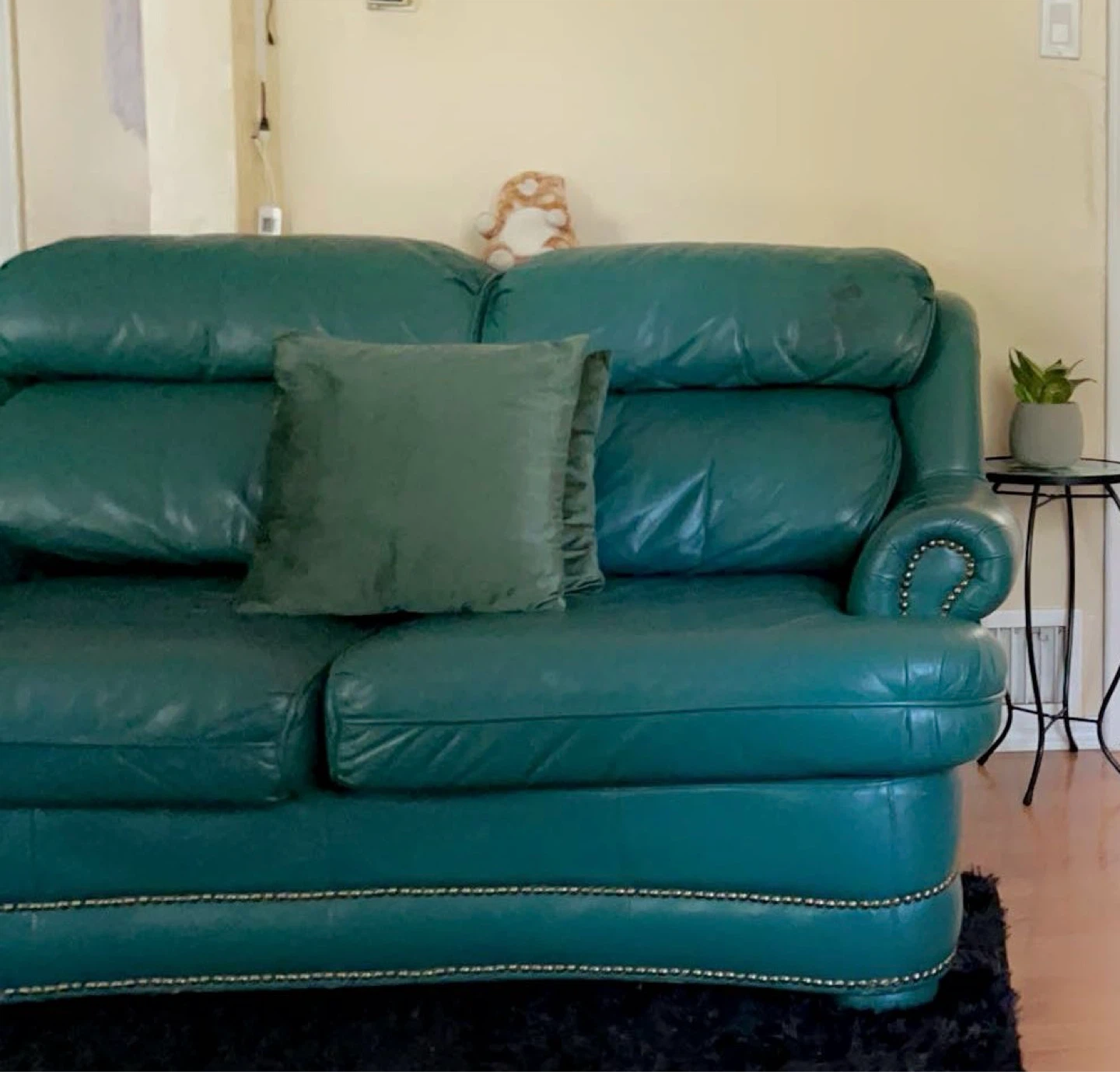 Teal Leather Loveseat