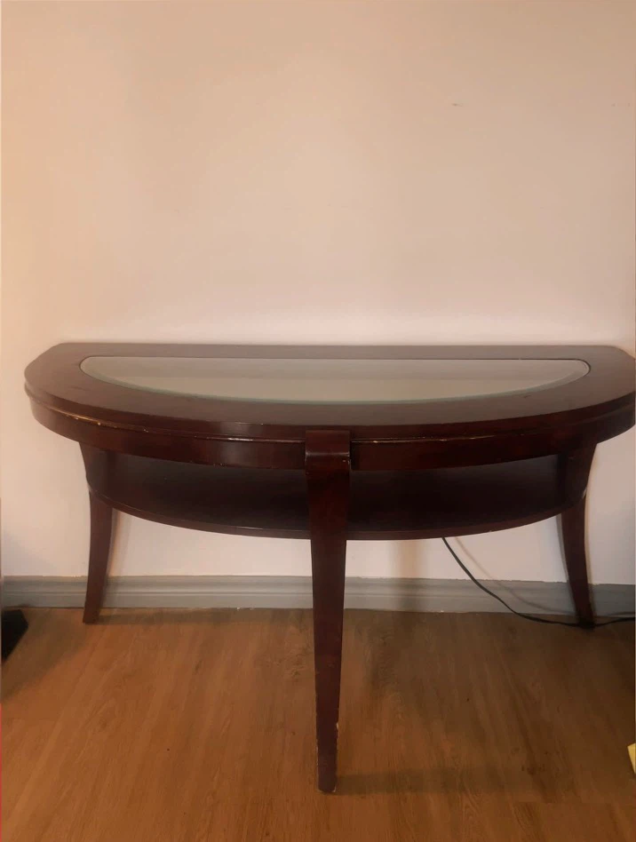 Half-moon wooden table with glass top