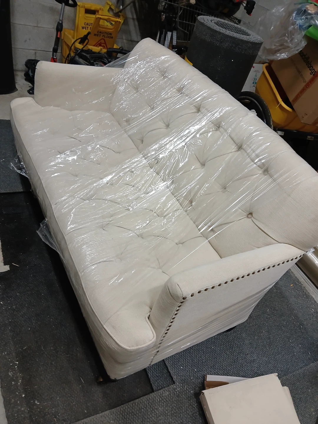 Cream Tufted Sofa