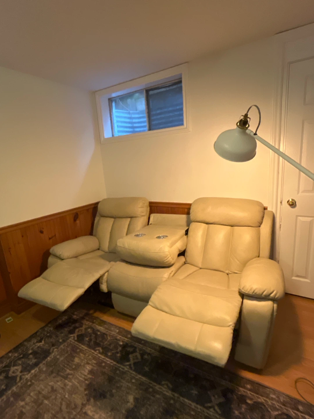 Tan Leather Reclining Sofa with Cup Holders