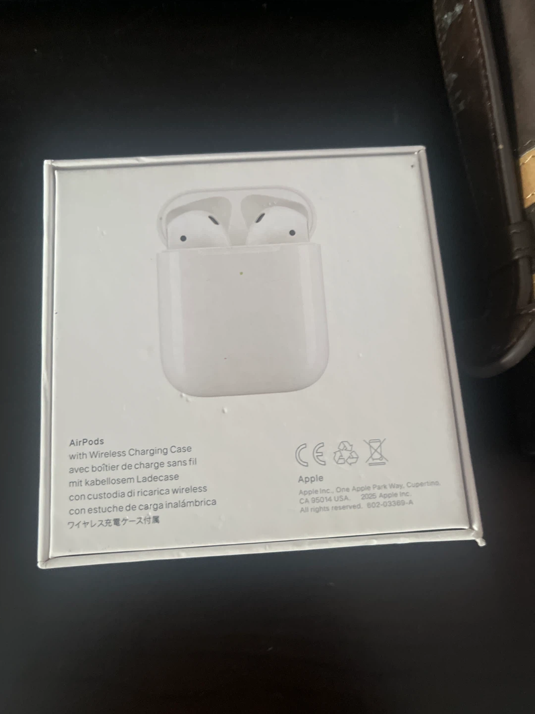 Apple AirPods (2nd Gen) with Charging Case - photo 2