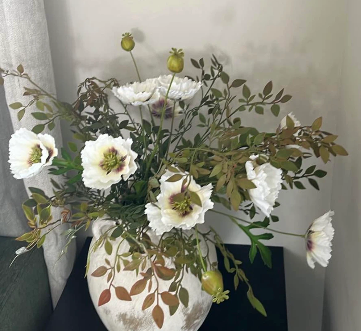 White Floral Arrangement in Decorative Vase