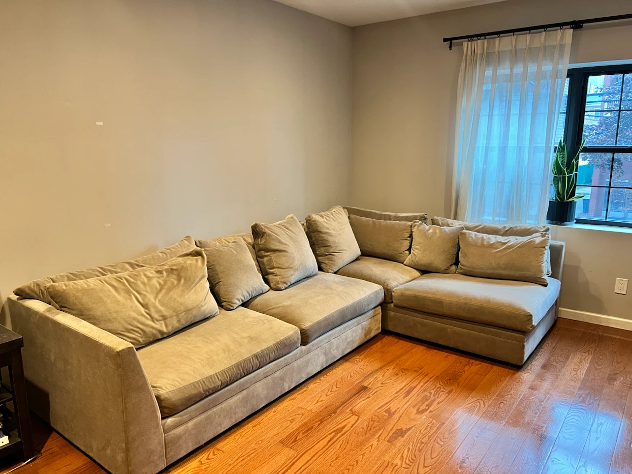 Large Beige Sectional Sofa with Ottoman