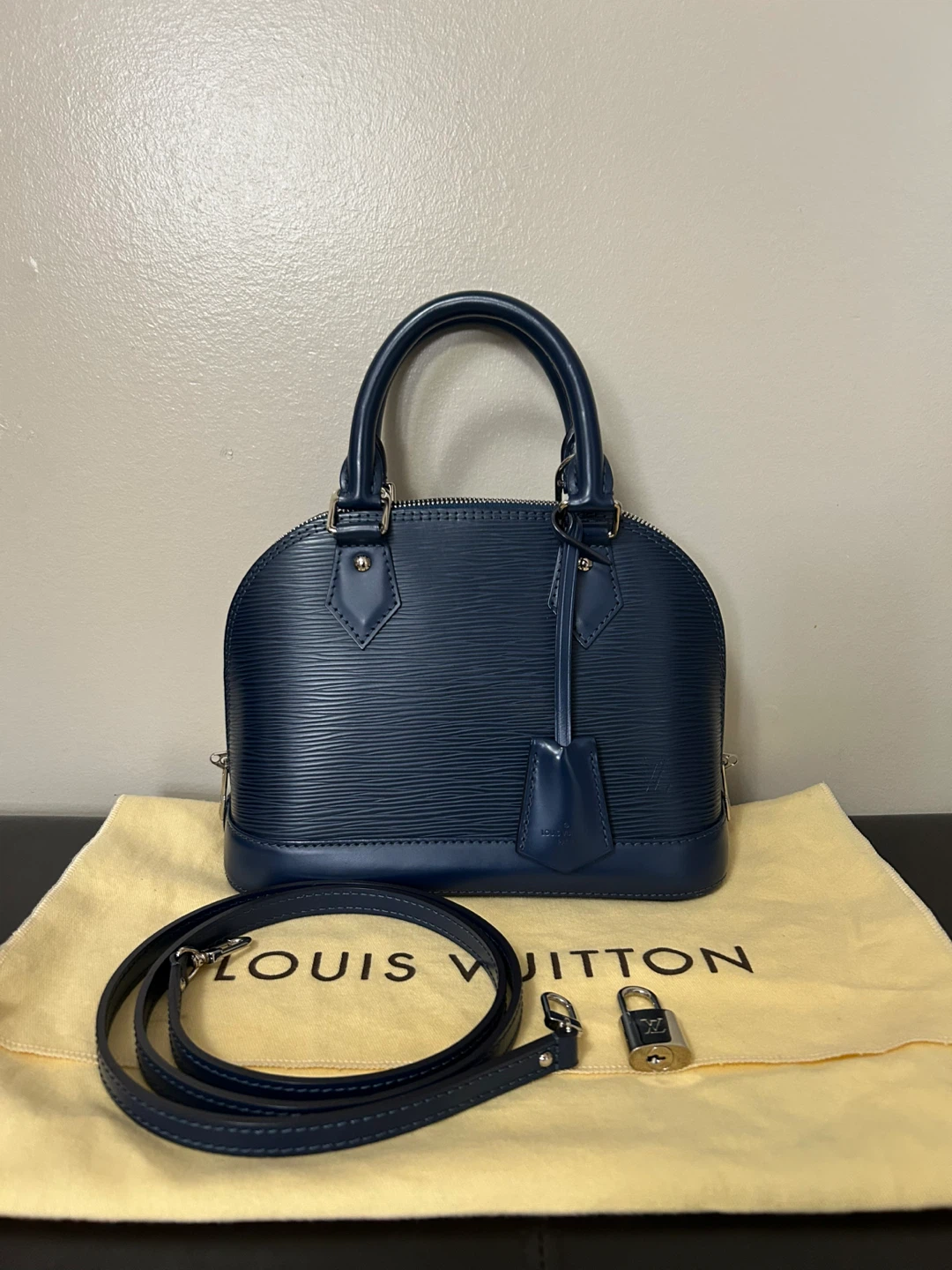 Authentic Louis Vuitton Epi Leather Alma BB Handbag Blue