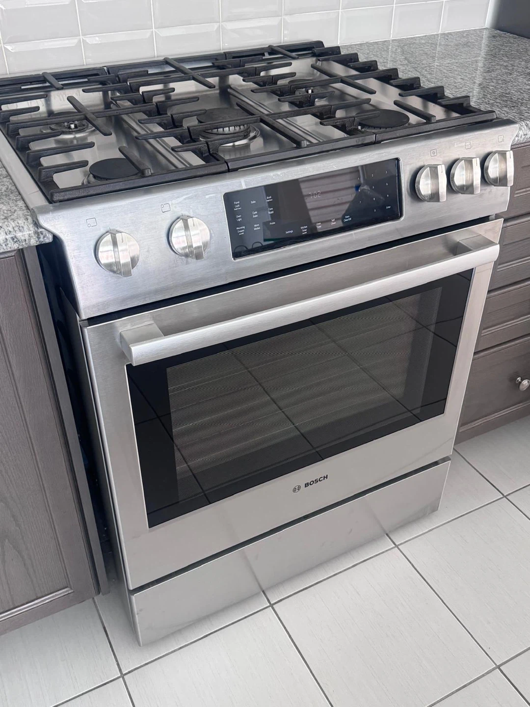 Bosch Stainless Steel Gas Range and Hood Fan
