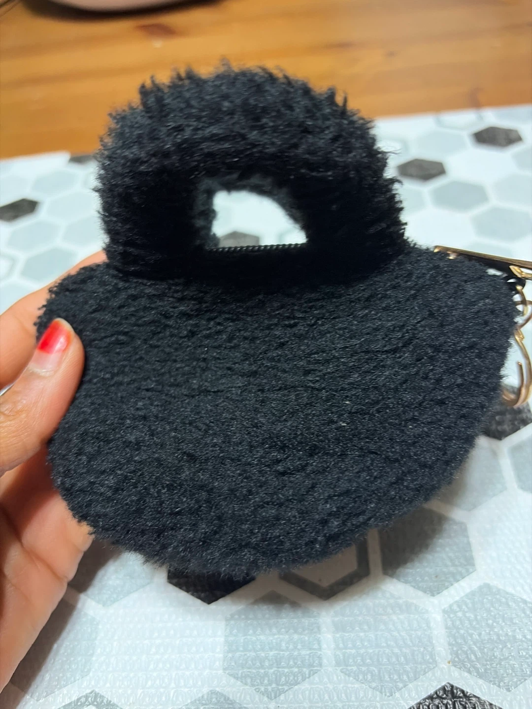 Claire's black fuzzy keychain purse