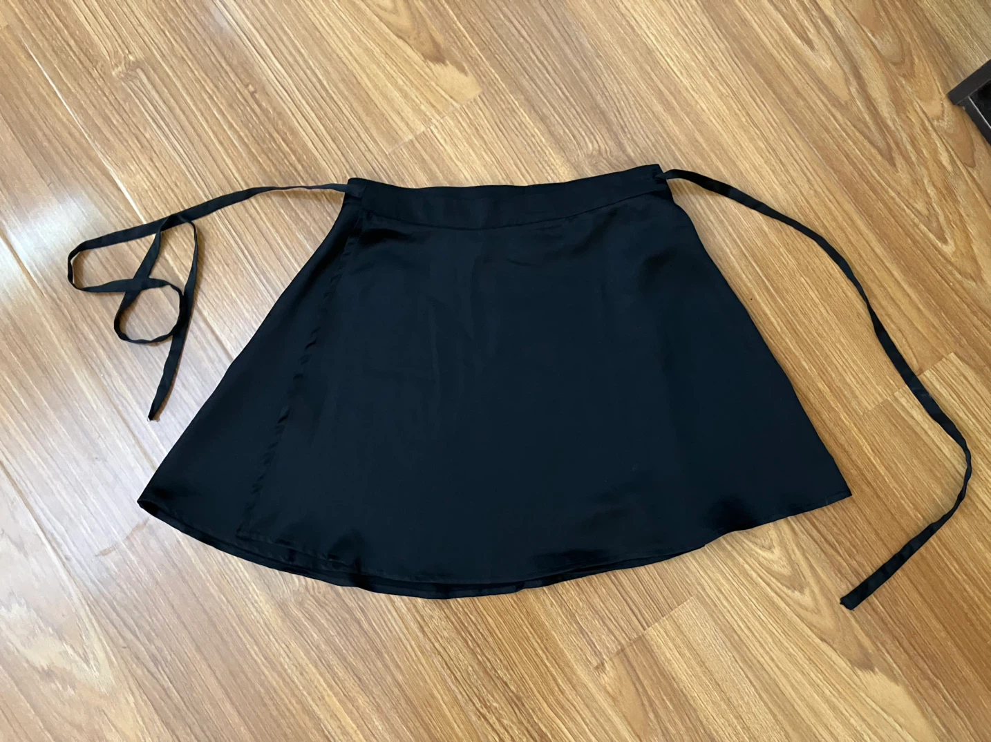 Black flowy wraparound skirt, silk material size small