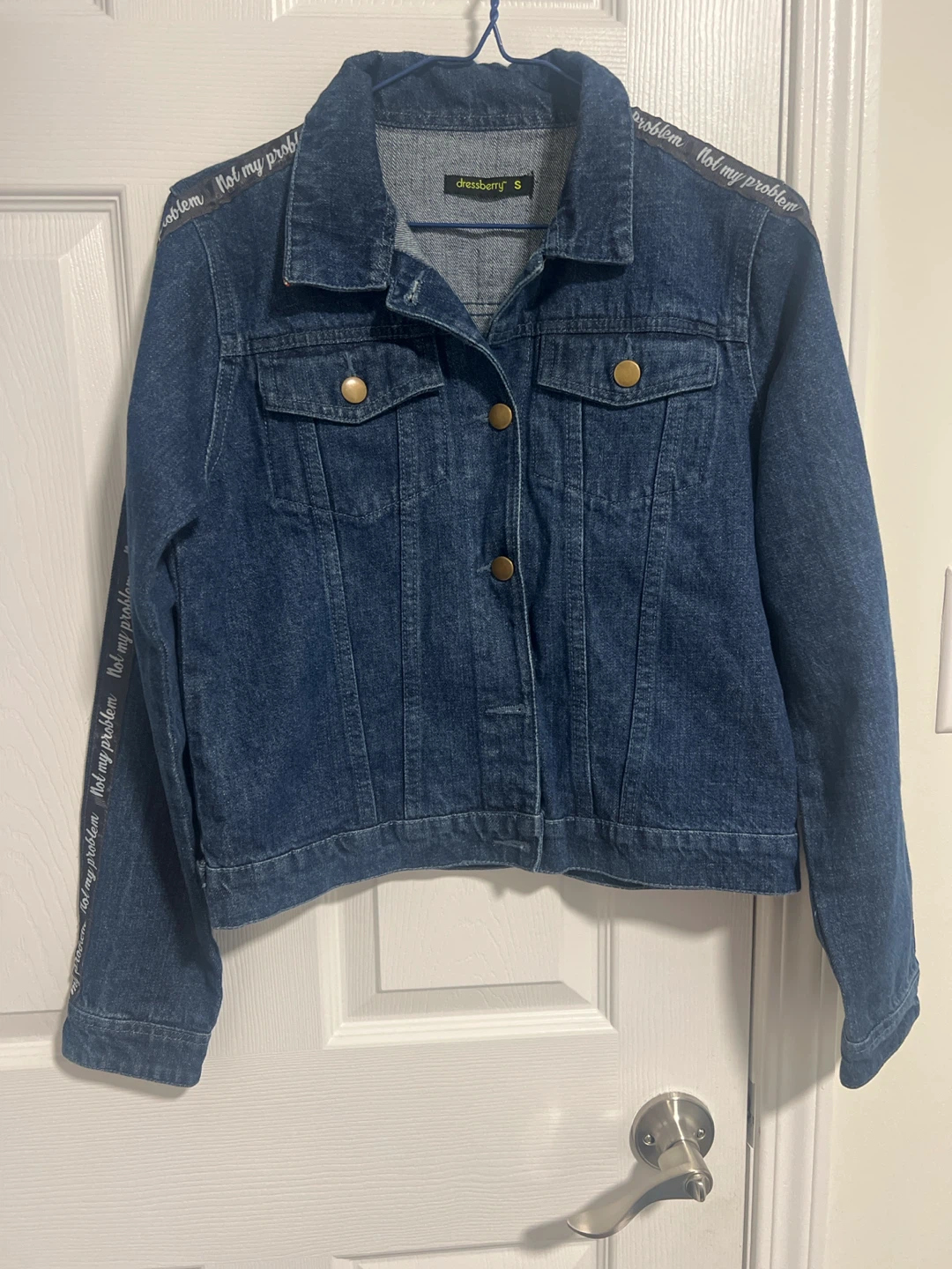 Denim jacket, black pants and a top
