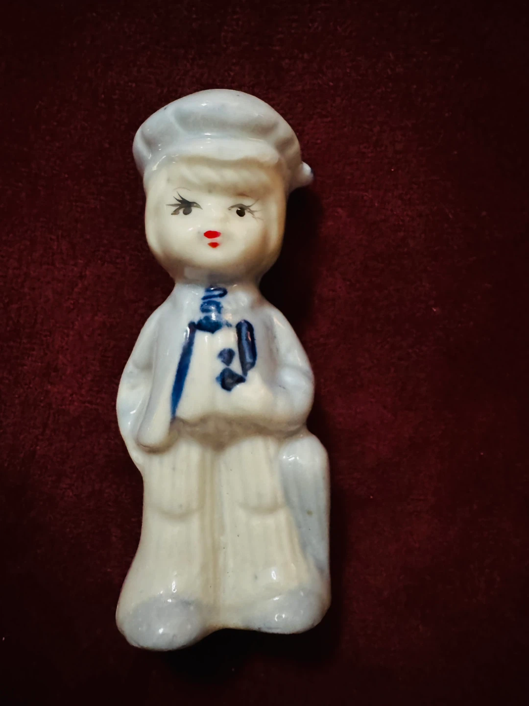 Ceramic Figurine of a Person with a Hat