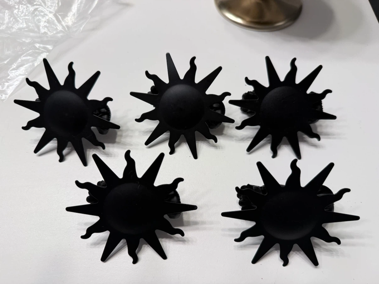 5 Black Sun Curtain Holders & candle holder