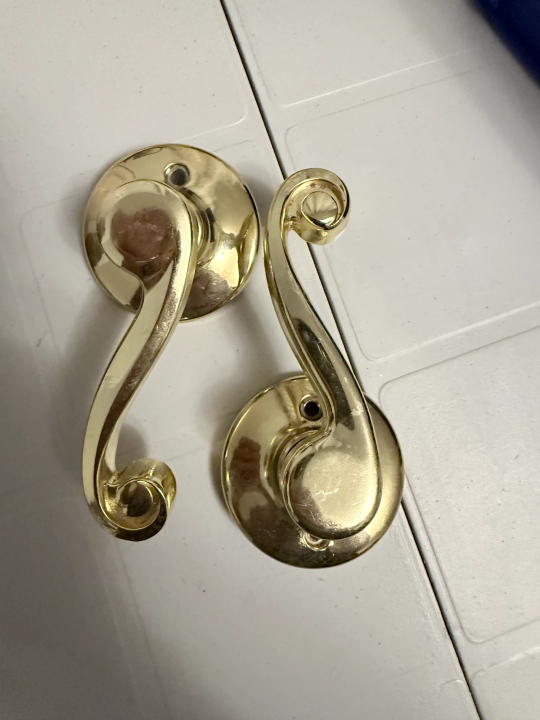 Two Gold-tone Door Handles
