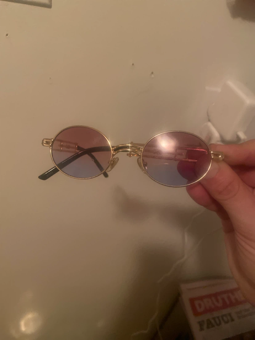Gold frame circular sunglasses with gradient lenses