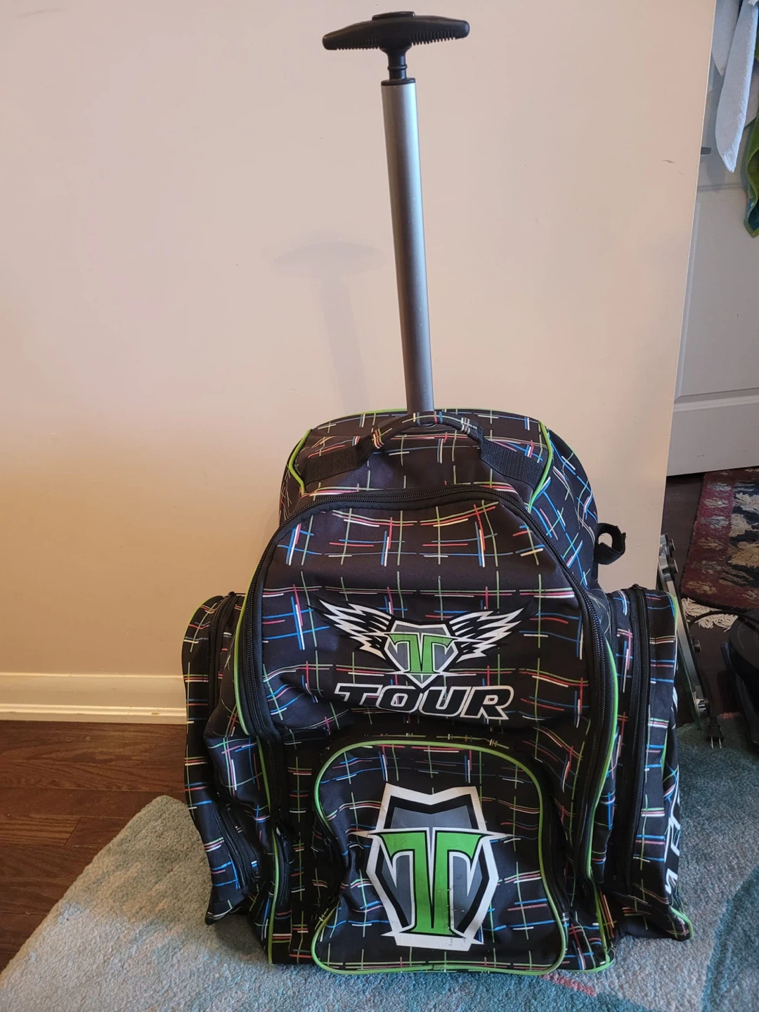 TOUR Rolling Backpack