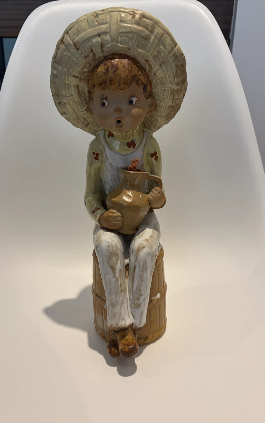 Large Vintage Mann Ceramic Figurine with actual dried flowers