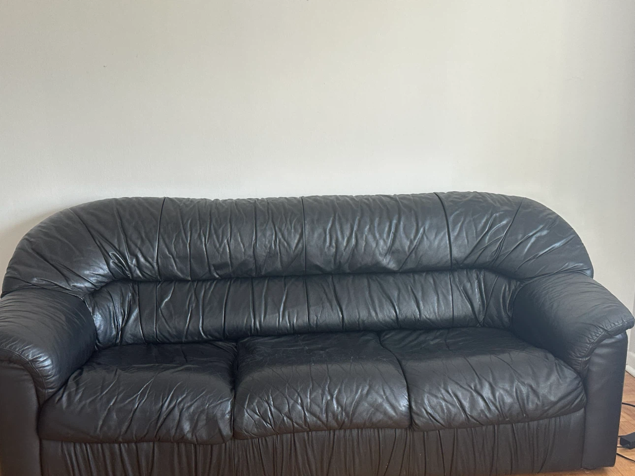 Black leather sofa and armchair set