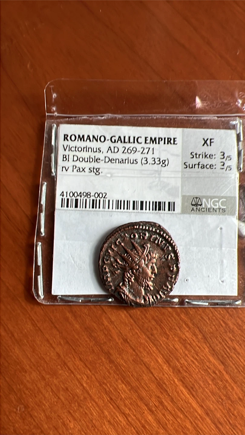 Victorinus ancient coin graded ngc xf cracked slab