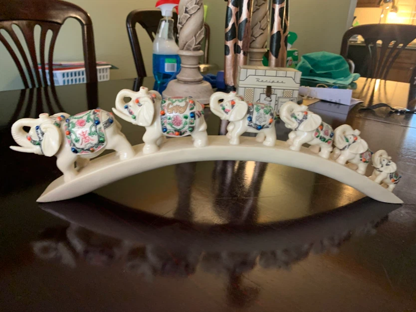 Elephant Figurine on Curved Base