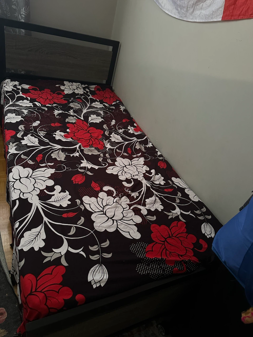 Single Bed Frame with Floral Bedding