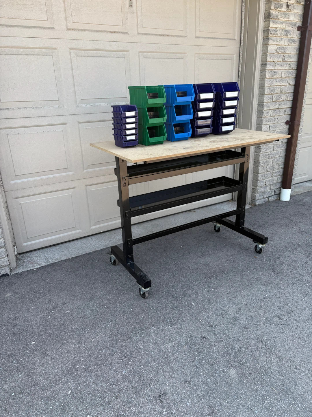 Moveable work bench with bins for storage. - photo 2
