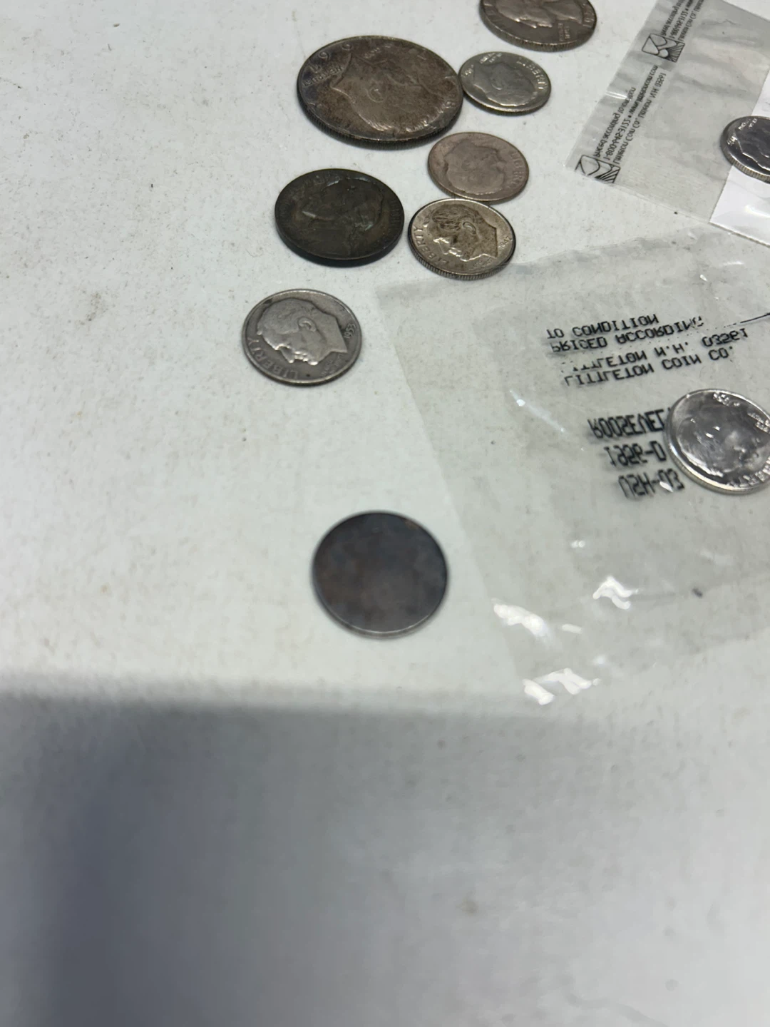 12 silver U.S. coins dimes, quarters, half and war nickel - photo 2