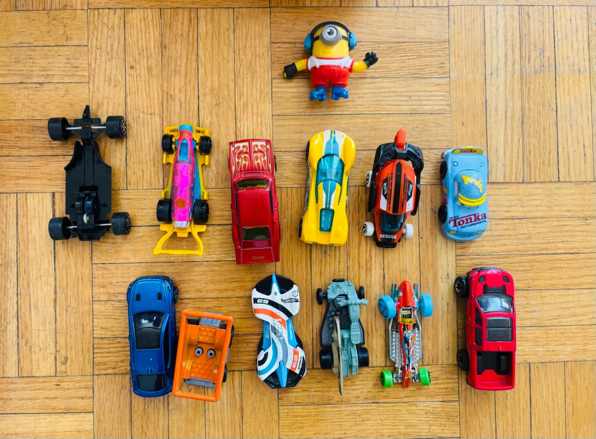 Assorted Toy Vehicles and Minion Figure