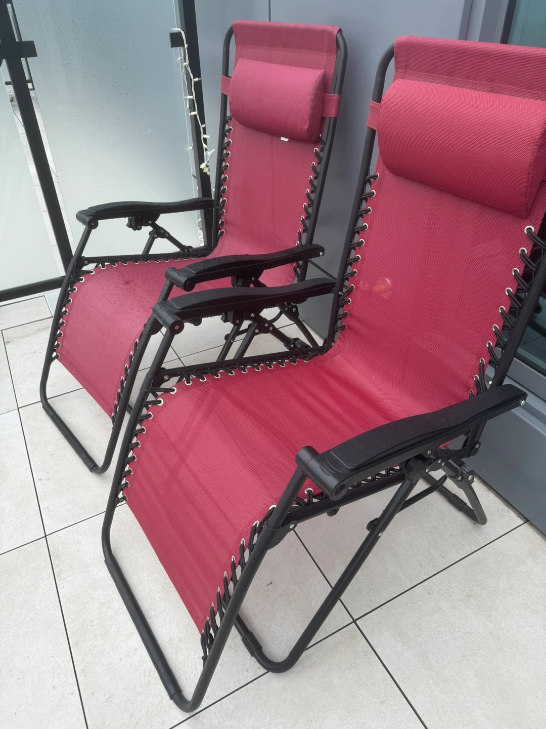 Two Red Zero Gravity Chairs